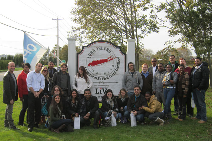 group of LIHA members stand outside Long Islands first craft distillery