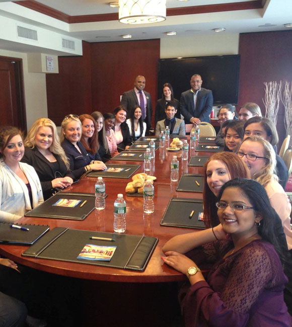group of LIHA members in board room for a meeting